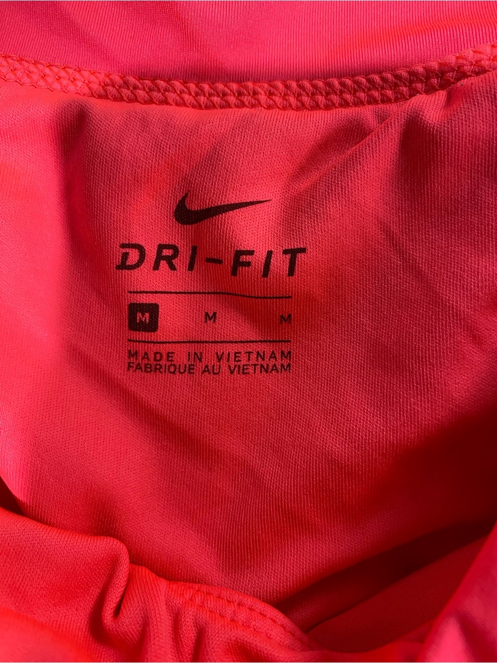 Nike Dri-FIT Athletic Top in Coral Red